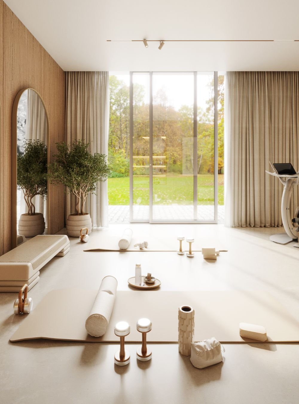 A luz natural transforma este home gym num refúgio de wellness, destacando a sobriedade do interior design e da decoração para casas modernas.