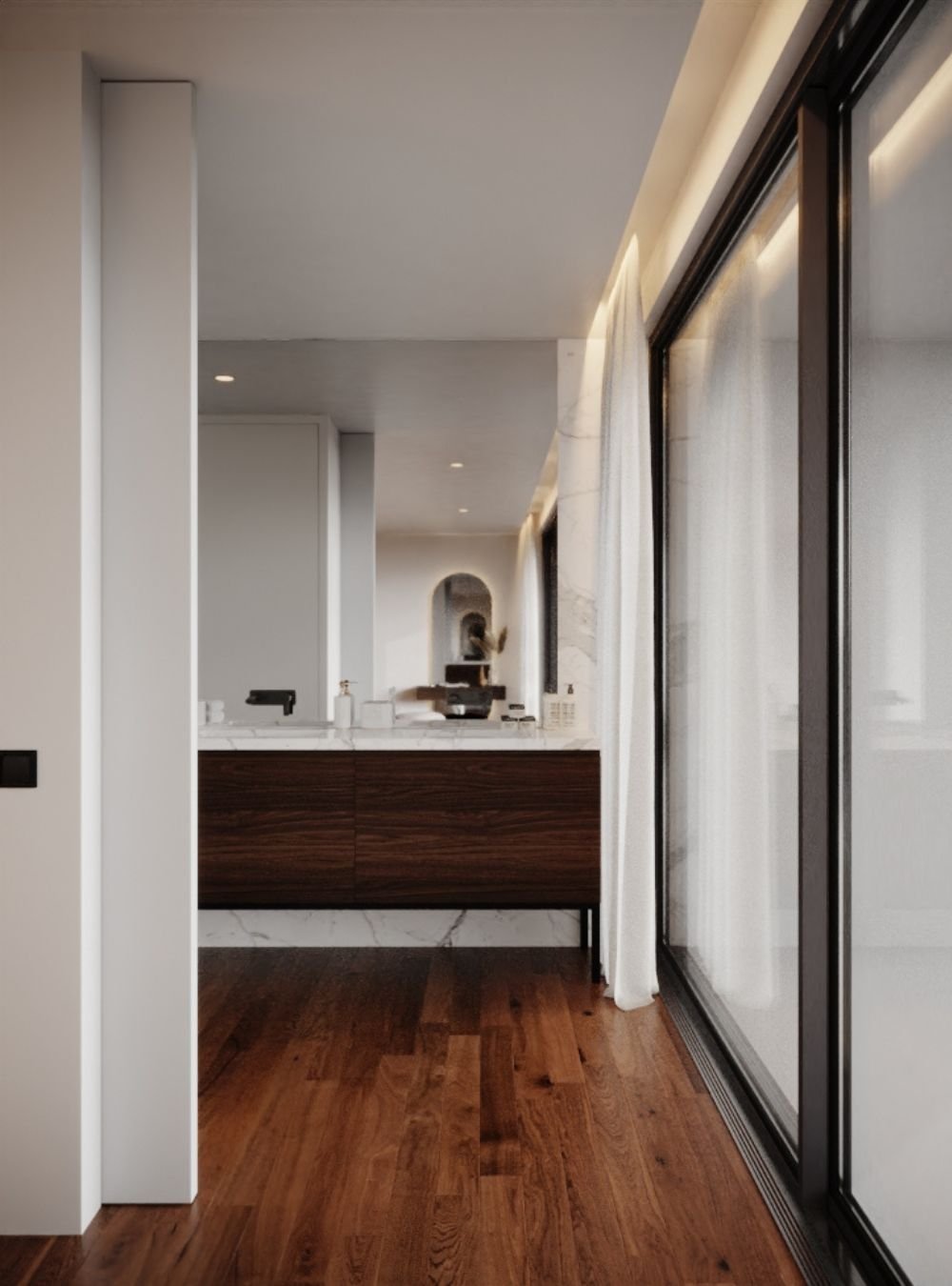 Detalhe de interior design na transição da suite, valorizando os requintados móveis de casa de banho em madeira que caracterizam as casas de banho modernas.