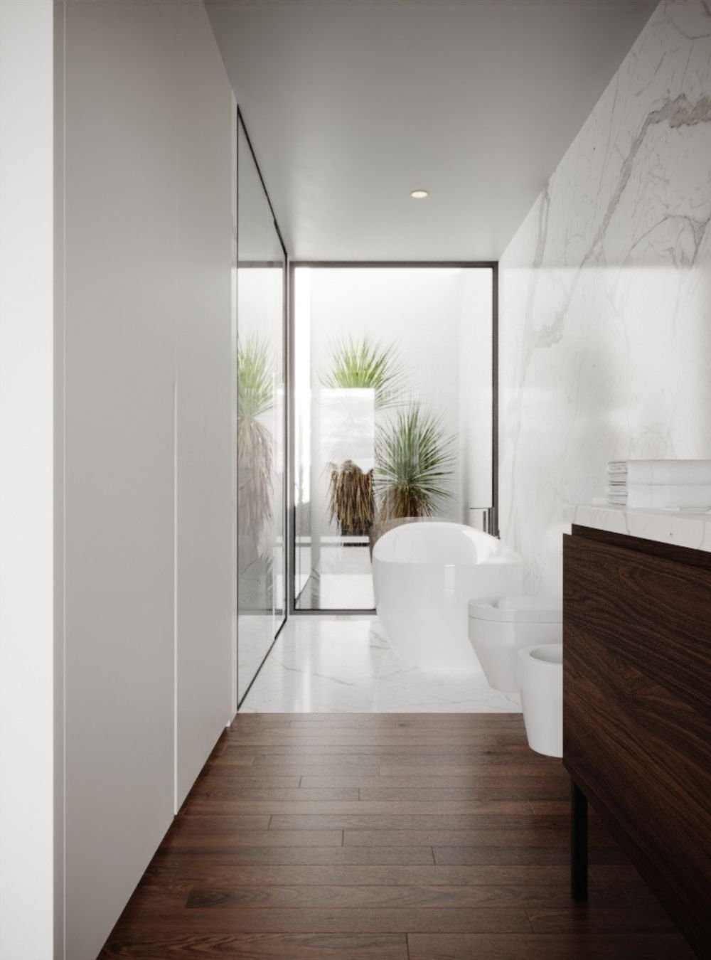 A elegância das casas de banho modernas ganha destaque neste projeto de interior design, conjugando sofisticados móveis de casa de banho com a luz exterior.