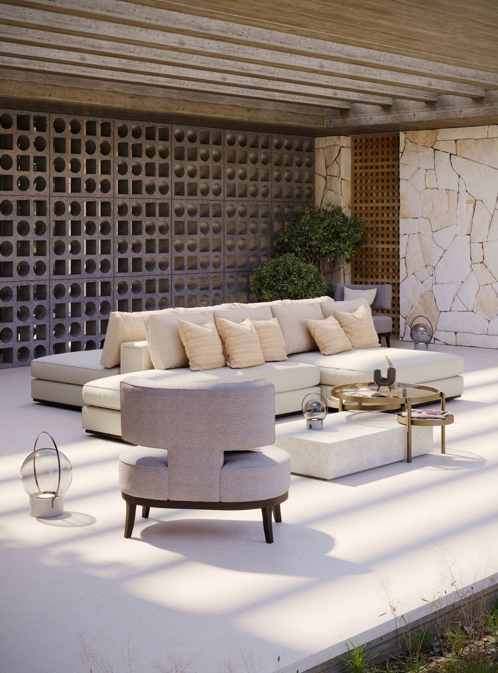 Cadeirão cinzento e sofá amplo em alpendre com cobogós, refletindo a excelência do mobiliário de jardim através de serviços de decoração e do cuidado design de interiores de casas modernas.